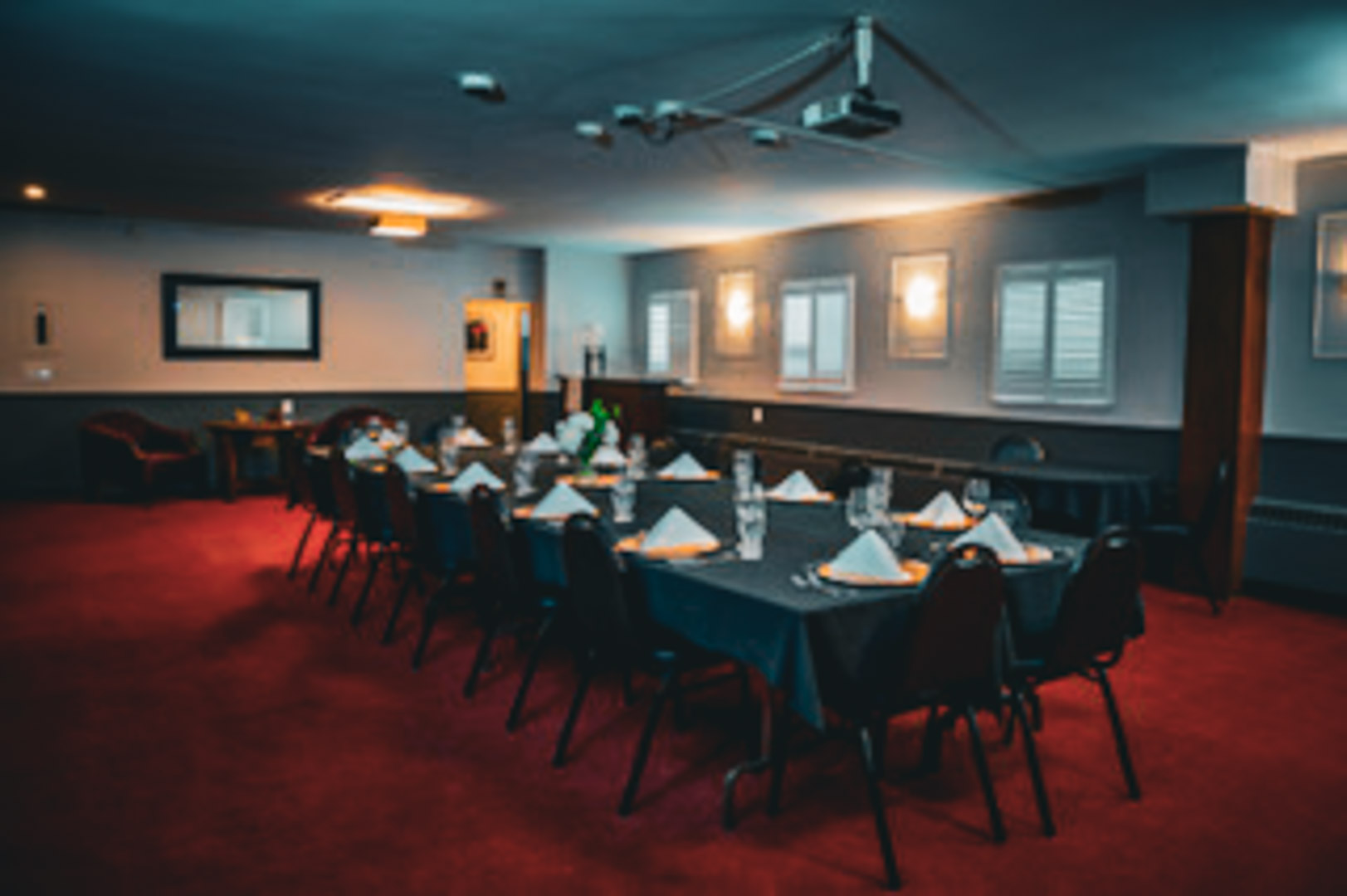 A long table set for dinner at The Brantford Club